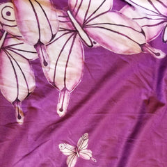 The Goddess Purple Wrap Skirt is designed to fit all the beautiful curves. Very comfy and unique style. Great for traveling.  - Medium weight soft jersey 92% polyester and 8% spandex - Available in one size - The waist tie is made from bamboo jersey fabric - Watercolor Butterflies  - Exclusive design by RedButterfly by Omaris