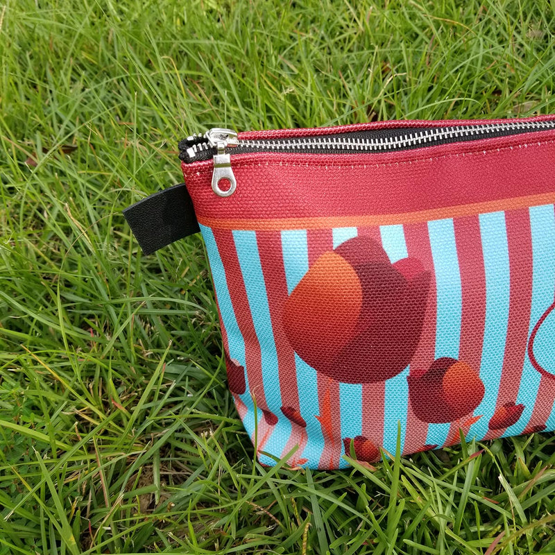 There are many ways you can use your Redblossom Makeup Bag, the options are endless! - Denim Lined - 100% polyester textured canvas - Convenient inside pocket - Metal zipper - Size 12 inches