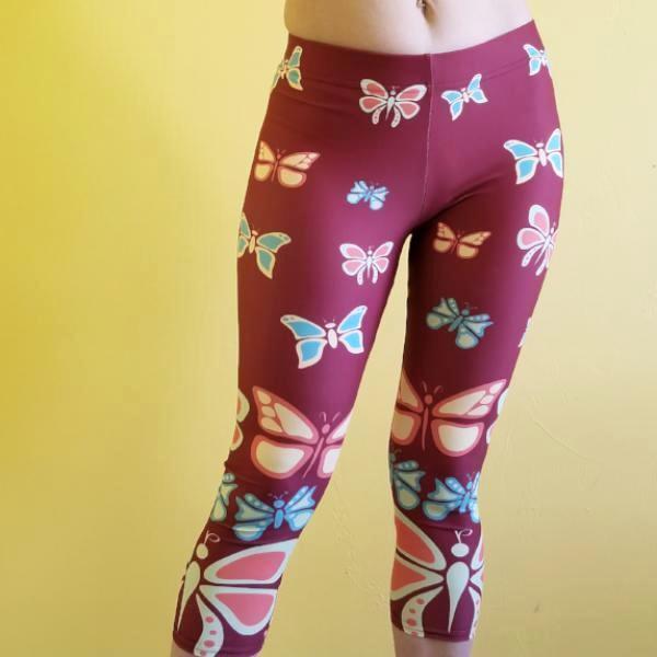 Butterflylove Red Capris Super soft and comfortable. Butterflies all over a beautiful red canvas.  - 82% polyester/18% spandex  - The material has a four-way stretch. Perfect for your curves  - Made with a smooth, comfortable microfiber yarn by RedButterfly by Omaris