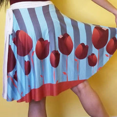 A very romantic look inspired in tulips and stripes with blue and brown colors. The full circle printed wrap skirt is designed to fit all the beautiful curves. Very comfortable. by RedButterfly by Omaris