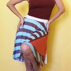 A very romantic look inspired in tulips and stripes with blue and brown colors. The full circle printed wrap skirt is designed to fit all the beautiful curves. Very comfortable. by RedButterfly by Omaris