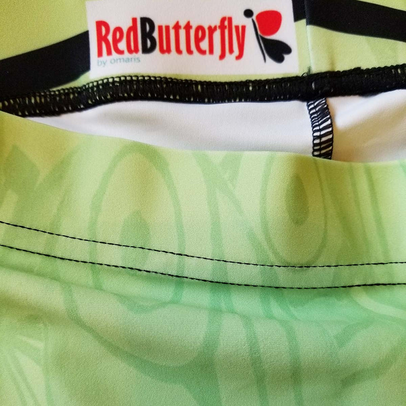 Women's Activewear. Comfortable Capris leggings with soft fabric. Green mint with watercolor butterflies. Get the matching outfit! Exclusive design by RedButterfly by Omaris.