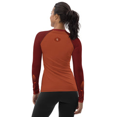 RedBlossom Tulip Orange Rash Guard. The beauty of earthy colors and tulips.  The slim fit, flat ergonomic seams, and the longer body give extra comfort. - 82% polyester, 18% spandex - 38-40 UPF - Fitted rash guard design - Comfortable longer body and sleeves - Flatseam and cover stitch - Sweatproof - Very soft four-way stretch fabric 