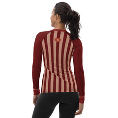 With RedBlossom Brown with Stripes Workout Wings be ready to stand out!  It protects you from the sun, wind, and other elements while doing sports, and the slim fit, flat ergonomic seams, and the longer body give extra comfort. - 82% polyester, 18% spandex - 38-40 UPF - Fitted design - Comfortable longer body and sleeves - Flatseam and cover stitch - Sweatproof