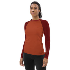 RedBlossom Tulip Orange Rash Guard. The beauty of earthy colors and tulips.  The slim fit, flat ergonomic seams, and the longer body give extra comfort. - 82% polyester, 18% spandex - 38-40 UPF - Fitted rash guard design - Comfortable longer body and sleeves - Flatseam and cover stitch - Sweatproof - Very soft four-way stretch fabric 