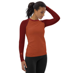 RedBlossom Tulip Orange Rash Guard. The beauty of earthy colors and tulips.  The slim fit, flat ergonomic seams, and the longer body give extra comfort. - 82% polyester, 18% spandex - 38-40 UPF - Fitted rash guard design - Comfortable longer body and sleeves - Flatseam and cover stitch - Sweatproof - Very soft four-way stretch fabric 