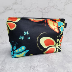 Sure to be one of your favorites! Unique butterfly design made from durable canvas with zipper, and guess what? It has two inside pockets! There are many ways you can use your Butterflylove Makeup Bag, the options are endless! Great for traveling, for dance classes, makeup bag and more! - Denim Lined - 100% polyester textured canvas - Two convenient inside pockets - Metal zipper - Size 12 inches - Exclusive design by RedButterfly by Omaris