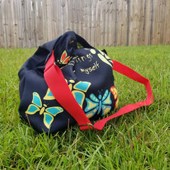 Butterflylove Tote is the perfect size for carrying a change of clothes, your Butterfly Makeup Bag, and why not? Your favorite book! . Tote made from a soft, supple double knit neoprene fabric, 92% polyester, 8% spandex. Butterfly vibrant design. Easy adjustable 44