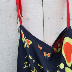 Butterflylove Tote is the perfect size for carrying a change of clothes, your Butterfly Makeup Bag, and why not? Your favorite book! . Tote made from a soft, supple double knit neoprene fabric, 92% polyester, 8% spandex. Butterfly vibrant design. Easy adjustable 44