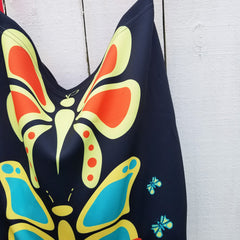 Butterflylove Tote is the perfect size for carrying a change of clothes, your Butterfly Makeup Bag, and why not? Your favorite book! . Tote made from a soft, supple double knit neoprene fabric, 92% polyester, 8% spandex. Butterfly vibrant design. Easy adjustable 44