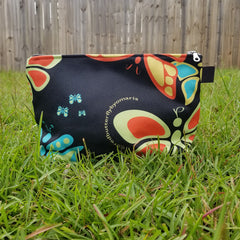 Sure to be one of your favorites! Unique butterfly design made from durable canvas with zipper, and guess what? It has two inside pockets! There are many ways you can use your Butterflylove Makeup Bag, the options are endless! Great for traveling, for dance classes, makeup bag and more! - Denim Lined - 100% polyester textured canvas - Two convenient inside pockets - Metal zipper - Size 12 inches - Exclusive design by RedButterfly by Omaris