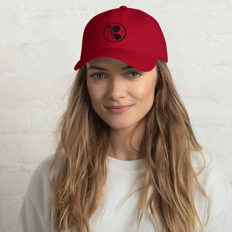 RedButterfly Red Hat has a low profile with an adjustable strap and curved visor.  - 100% chino cotton twill - Unstructured, 6-panel, low-profile - 6 embroidered eyelets