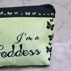 Sure to be one of your favorites! Goddess Mint Makeup Bag made from durable canvas with zipper, and guess what? It has two inside pockets! Great for traveling, for dance classes, makeup bags, and more! - Denim Lined - 100% polyester textured canvas - Two convenient inside pockets - Metal zipper - Size 12 inches - Exclusive design by RedButterfly by Omaris  