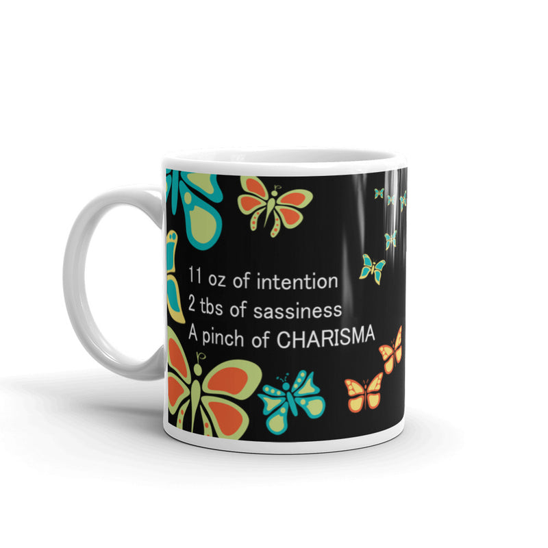 Whether you're drinking your morning coffee, your evening tea, or something in between – this mug is for you! I prefer to drink "Café con Leche" with my Butterfly Charisma Mug every morning. - Ceramic - Dishwasher and microwave safe - White and glossy by RedButterfly by Omaris