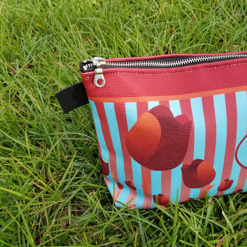 There are many ways you can use your Redblossom Makeup Bag, the options are endless! - Denim Lined - 100% polyester textured canvas - Convenient inside pocket - Metal zipper - Size 12 inches