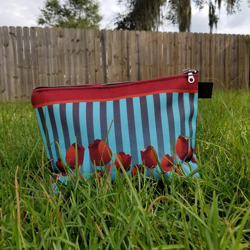 There are many ways you can use your Redblossom Makeup Bag, the options are endless! - Denim Lined - 100% polyester textured canvas - Convenient inside pocket - Metal zipper - Size 12 inches