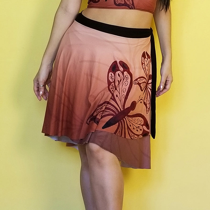  Neutral colors so you can match this beautiful wrap skirt with many other colors.  Very comfortable and with a fashionable style. - Medium weight soft jersey 92% polyester and 8% spandex - One Size - The waist tie is made with bamboo jersey fabric - Watercolor print - Exclusive design by RedButterfly by Omaris